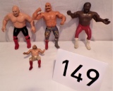 3 8 inch WWF wrestlers and 1 thumb Wrestler