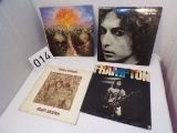 LOT of 4 records- 33 RPM's- The Moody Blues, Bob Dylan, Peter Frampton, Harry Chapin
