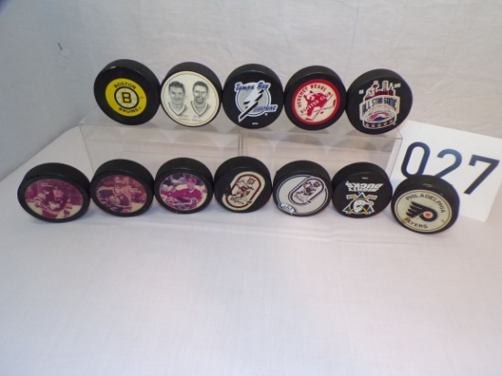 12 hockey pucks