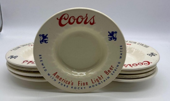 Nine Coors ceramic ashtrays