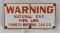 Porcelain Pioneer Pipeline Warning Sign