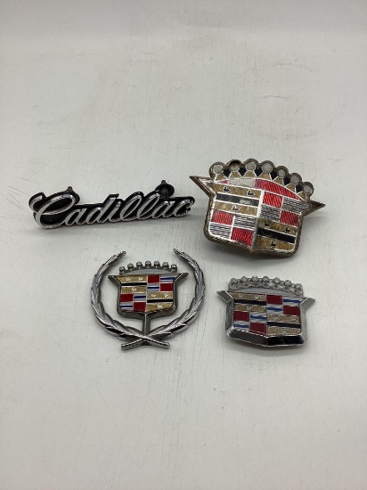 Five Cadillac Car Emblems