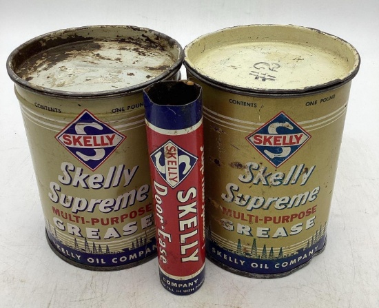 Two Skelly One Pound Grease Cans and Door-Ease Tube