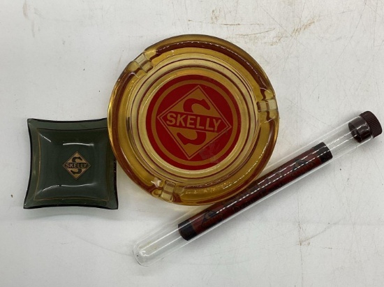 Two Skelly Ashtrays and Skelly Crayon