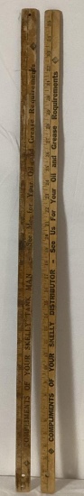 Two Skelly Yard Sticks
