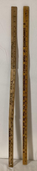 Two Skelly Yard Sticks