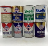 Eight Skelly Motor Oil Quart Cans