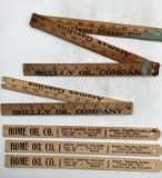 Skelly Folding Yardstick and Three Skelly Home Oil Company Model T Measuring Sticks