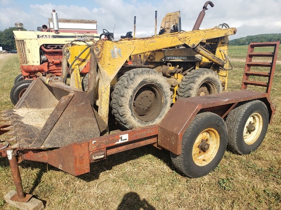 IH 3300 Series B Skid Loader gas with '70 Gehl trailer