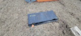Skid loader plate