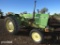 JD 1050 TRACTOR SHOWING APPX 2,406 HOURS SERIAL # 008056 ENGINE SERIAL # 3T09T-J