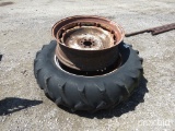 2 TRACTOR RIMS AND 1 TIRE