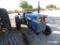 LONG 310 TRACTOR W/ MANUAL (SHOWING APPX 192 HOURS) (SERIAL # 007757)