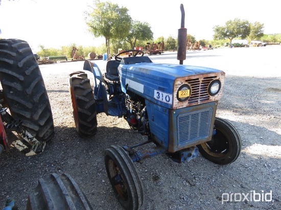 LONG 310 TRACTOR W/ MANUAL (SHOWING APPX 192 HOURS) (SERIAL # 007757)
