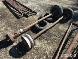 2 TRAILER AXLES W/ TIRES AND WHEELS