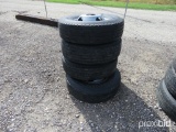 4 - 235/85R16 TIRES AND WHEELS