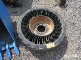 12N 16.5 SKID STEER TIRE AND RIM