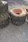 2 SKID STEER TIRES AND RIMS