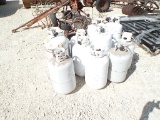 4 - 10 GALLON BOTTLES AND 7 - 7 GALLON BOTTLES