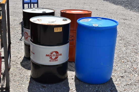 3 - METAL BARRELS AND 1 - PLASTIC BARREL