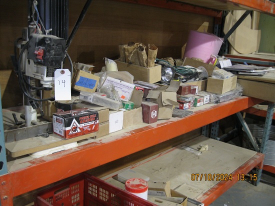Shelf full of screws, and assorted items