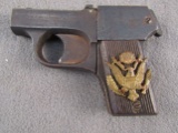 handgun: MOSSBERG BROWNIE MODEL, 22CAL SEMI AUTO PISTOL, S#25627