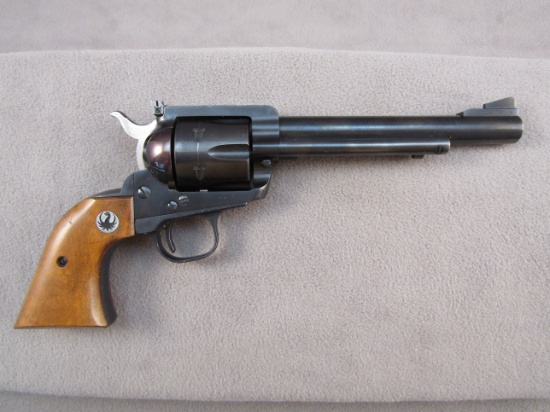 handgun: RUGER OLD MODEL BLACKHAWK, 357CAL REVOLVER, S#31677