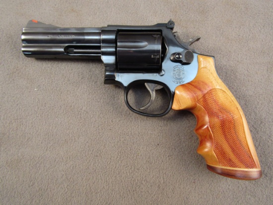 handgun: S&W Model 586, Revolver, .357 magnum, 6 shot, 4" barrel, S#AJF7632