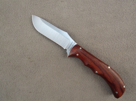 knife: NORTHWOODS KINFE CO, made in Gladstone, MI, walnut handle with leather sheath, 3.5" blade