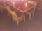 47 in x 29 in dining table with four chairs