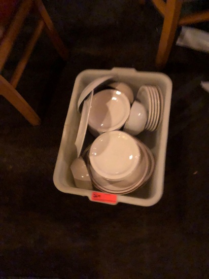 Plastic Tub full of misc. plates
