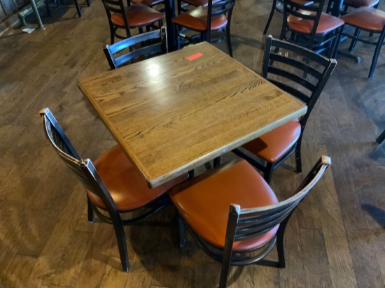 low top table and four chairs 29 in x 29 in
