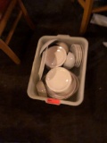 Plastic Tub full of misc. plates