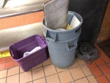 Two commercial trash cans with rolling caddy