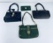 Lot Of 4 Dooney Bourke Purses And Wallets