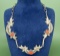Navajo Tufa Cast Sterling Silver Coral Necklace