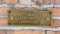 Cast Iron On this Site in 1897 Satire Sign