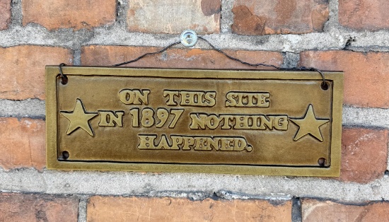 Cast Iron On this Site in 1897 Satire Sign