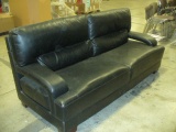 Black leather couch (7'2
