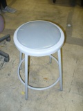 Gray sitting stool with back support