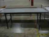 Gray work table (7'x3'x3')