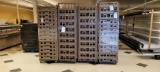 STACK OF PLASTIC TRAYS WITH DOLLY, ALL STACKS  7' TO 8' HIGH, QUANTITIES PE
