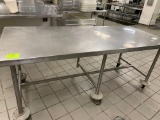 TABLE STAINLESS 84 X 36 WITH WHEELS,  1 WHEEL MISSING