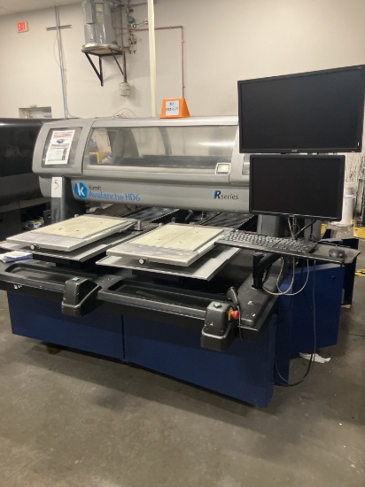 DUAL BRIDGE, DIRECT-TO-GARMENT (DTG) PRINTER, AN INDUSTRY-STANDARD MACHINE P
