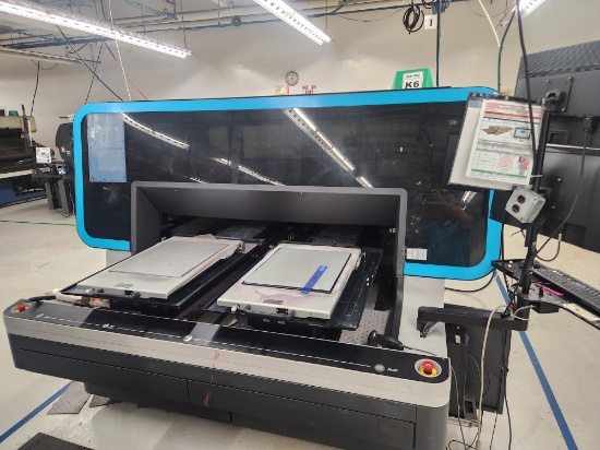 DUAL BRIDGE, DIRECT-TO-GARMENT (DTG) PRINTER, AN INDUSTRY-STANDARD MACHINE