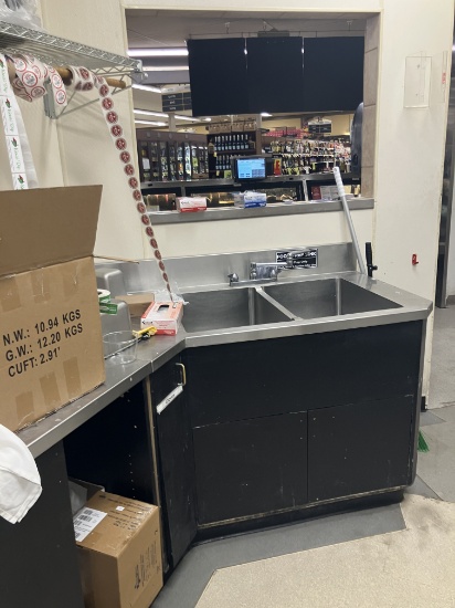 Metal table with cabinets and sink