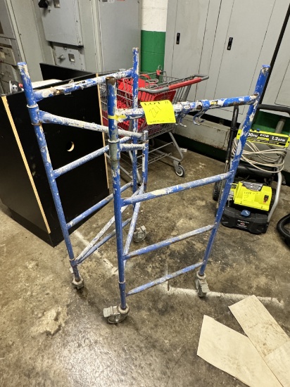 Metal divider on casters adjustable