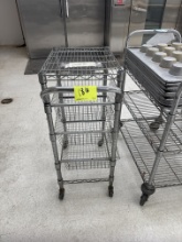 Metal rack w/ baskets on casters