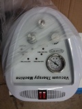 Vacuum therapy machine