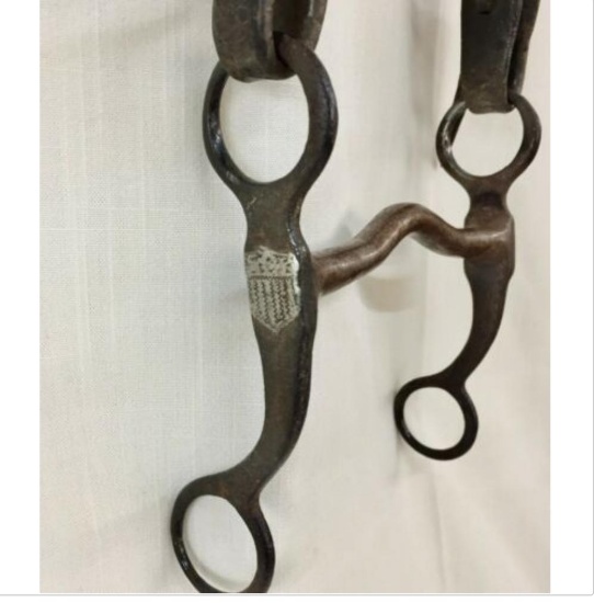 A Collectable Antique Shield Bit On An Old Leather Headstall